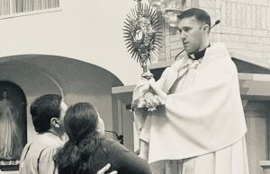 Couple being christened